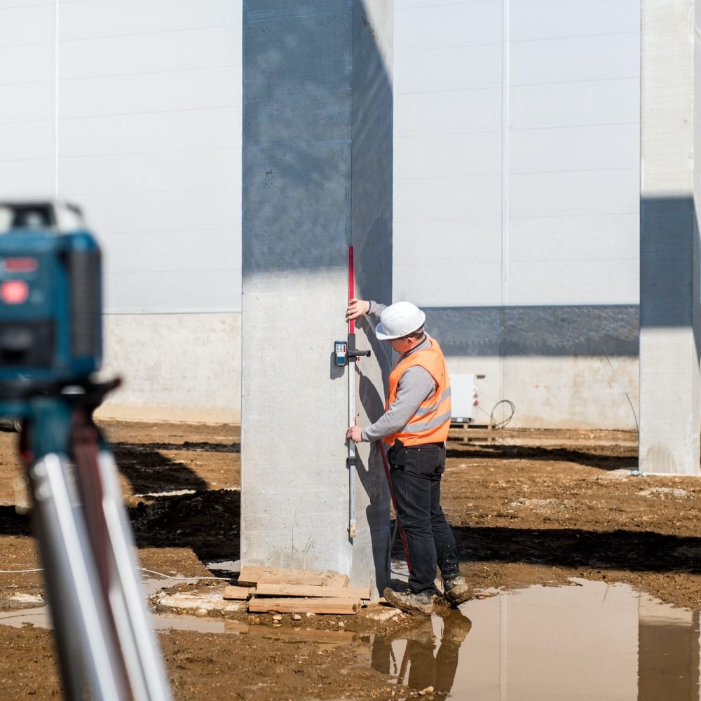 professional-surveyor-using-gps-system-and-theodolite-for-correct-level-on-construction-site.jpg professional-surveyor-using-gps-system-and-theodolite-for-correct-level-on-construction-site.jpg